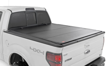 Hard Tri-Fold Flip Up Bed Cover | 5'7" Bed | Ford F-150 2WD/4WD (04-14) - Off Road Canada